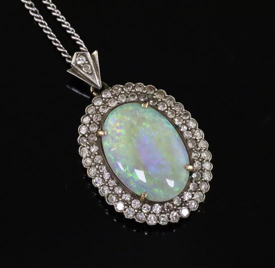 An antique gold, white opal and diamond cluster oval pendant, on a later 9ct white gold chain, pendant 24mm.